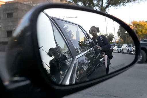 Takia Phillips, 15, arrives at her school on Friday, October 18, 2024, after she was one of two chi…