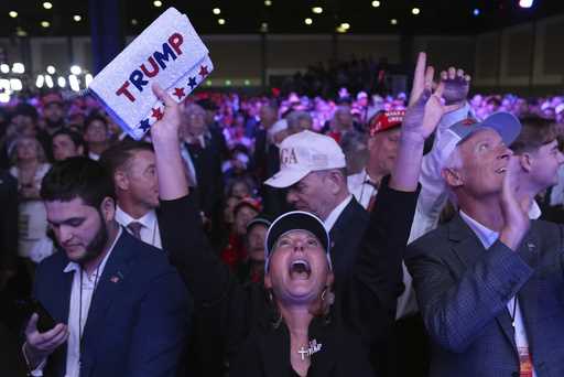 Supporters watch returns at a campaign election night watch party for Republican presidential nomin…