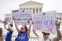 People demonstrate outside the Supreme Court, June 30, 2023, in Washington