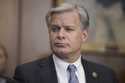 FBI Director Christopher Wray listens during a meeting of the Justice Department's Election Threats…