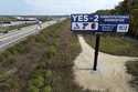 A billboard promoting a ballot measure to legalize sports betting in Missouri is seen along Interst…