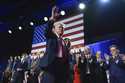 Republican presidential nominee former President Donald Trump waves as he walks with former first l…