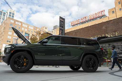 A Rivian R1S is displayed outside of the auto manufacturer's new space at Ponce City Market on Octo…