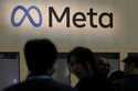 Attendees visit the Meta booth at the Game Developers Conference in San Francisco on March 22, 2023…