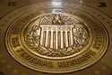 FILE- The seal of the Board of Governors of the United States Federal Reserve System is displayed i…