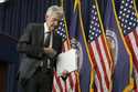 Federal Reserve Chairman Jerome Powell walks out after holding a news conference following the Fede…