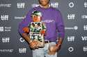 Pharrell Williams arrives on the red carpet for the premiere of 'Piece by Piece' at the Princess of…