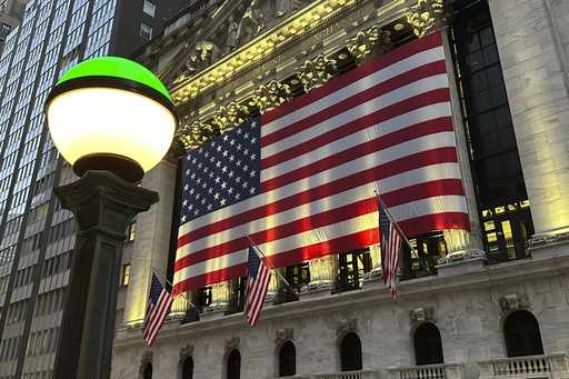 The American flags hangs on the facade of the New York Stock Exchange in New York's Financial Distr…