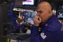 Specialist Philip Finale works on the floor of the New York Stock Exchange, Tuesday, March 11, 2025…