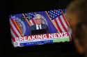 A news conference by Federal Reserve Chair Jerome Powell is displayed on the floor of the New York …