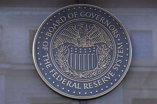 The seal of the Federal Reserve Board is seen at the building in Washington, December 8, 2024