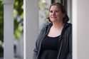 Rebecca Wood stands for a portrait outside her home, Friday, August 30, 2024, in Maynard, Mass