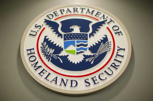 Homeland Security logo is seen during a joint news conference in Washington, February 25, 2015