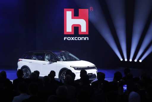 Foxconn's Foxtron Model C electric car is displayed during the Hon Hai Tech Day…