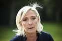 French far-right leader Marine Le Pen answers reporters at the Elysee Palace after a meeting with F…