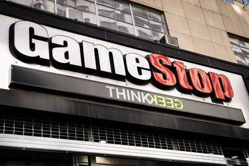 Pedestrians pass a GameStop store on 14th Street at Union Square, Thursday, January 28, 2021, in th…