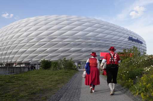 Bayern Munich fans arrive to the Allianz Arena prior to the Champions League semifinal first leg so…