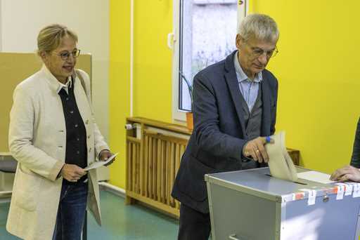 Hans-Christoph Berndt, a candidate for the AfD in the Brandenburg state elections, and his wife cas…