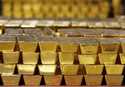 Gold bars are shown stacked in a vault at the United States Mint on July 22, 2014 in West Point, N