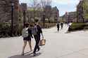 Students walk on the campus of Boston College, Monday, April 29, 2024, in Boston