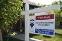 A "For Sale" sign is displayed in front of a home in Morton Grove, Ill