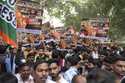 India's opposition Congress party members shout slogans during a protest against Indian billionaire…