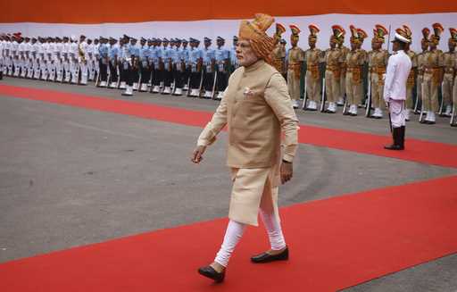 FILE-Indian Prime Minister Narendra Modi arrives at the Red Fort to address the nation on the occas…