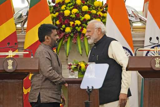 Indian Prime Minister Narendra Modi, right, shakes hand with Sri Lankan President Anura Kumara Disa…