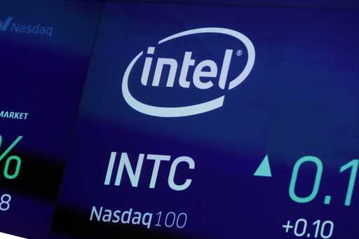 In this October 1, 2019, file photo the symbol for Intel appears on a screen at the Nasdaq MarketSi…