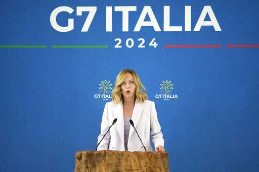 Italian Prime Minister Giorgia Meloni speaks during a final media conference at the G7 in Borgo Egn…