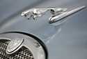 The hood ornament and a portion of the grill of a Jaguar automobile is shown at a dealership in Nor…