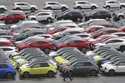 Cars for export are parked at a port in Yokohama, near Tokyo, on July 6, 2020