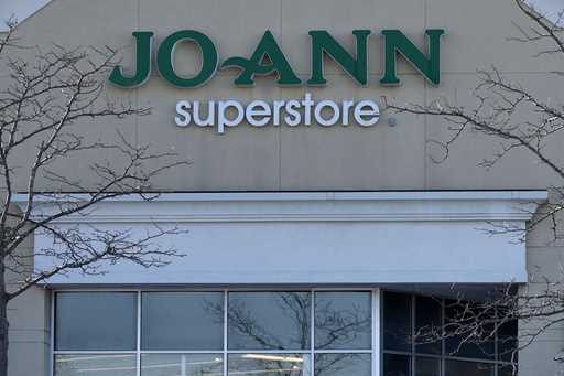 A logo sign outside of a Joann retail store is seen in Arlington Heights, Ill