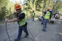 Carl Roath, left, a worker with the Mason County…