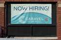 Hiring sign is displayed at a health service center in Chicago, Tuesday, January 21, 2025