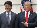 President Donald Trump and Canadian Prime Minister Justin Trudeau pose for a photo as Trudeau arriv…