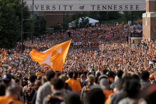 Tennessee fans gather outside Neyland Stadium before an NCAA college football game between Tennesse…