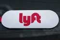 A Lyft logo is seen on a Lyft driver's car in Pittsburgh, January 31, 2018