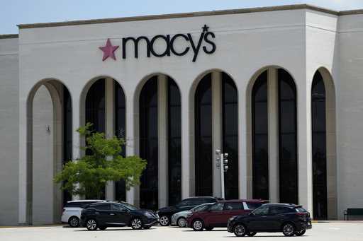 Cars are parked in front of a Macy's store at Hawthorn Mall in Vernon Hills, Ill