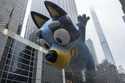 Handlers guide the Bluey balloon down Sixth Avenue during the Macy's Thanksgiving Day Parade, Thurs…