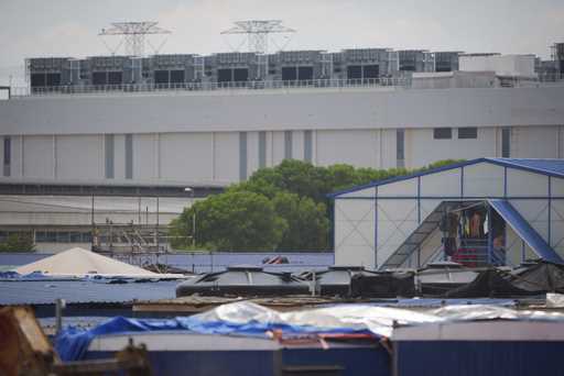 A lodging for construction workers is seen in front of a Data center in Sedenak Tech Park in Johor …