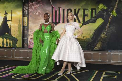 Cynthia Erivo, left, and Ariana Grande arrive at the premiere of 