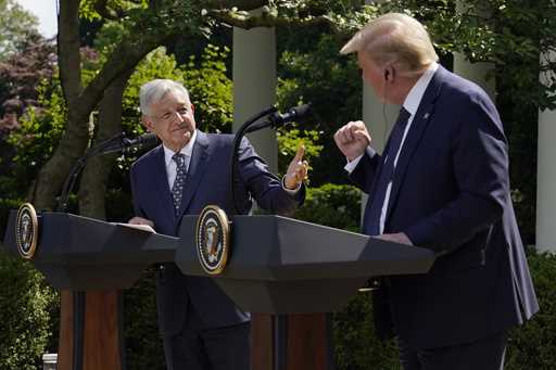 Mexico's President Andres Manuel Lopez Obrador, left, and President Donald Trump hold a joint news …