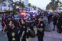 City of Miami Beach police officers respond to an incident during spring break, March 15, 2024, in …