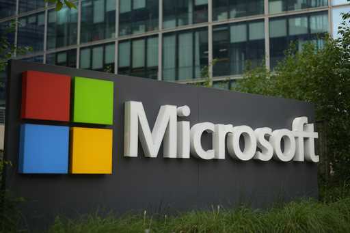 The Microsoft logo is displayed outside its French headquarters in Issy-les-Moulineaux, outside Par…