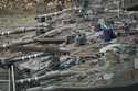 Israeli soldiers work on tanks in a staging area in northern Israel near the Israel-Lebanon border,…