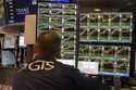 A specialist studies monitors on the New York Stock Exchange trading floor in New York on November …