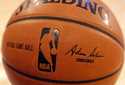 An NBA logo is seen on an official game ball before a basketball game, February 1, 2014, in New Yor…