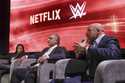 From left, Netflix Chief Content Officer Bela Bajaria, WWE President Nick Khan and WWE Chief Conten…