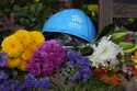 A Habitat for Humanity hard hat is among the items left in tribute to former President Jimmy Carter…